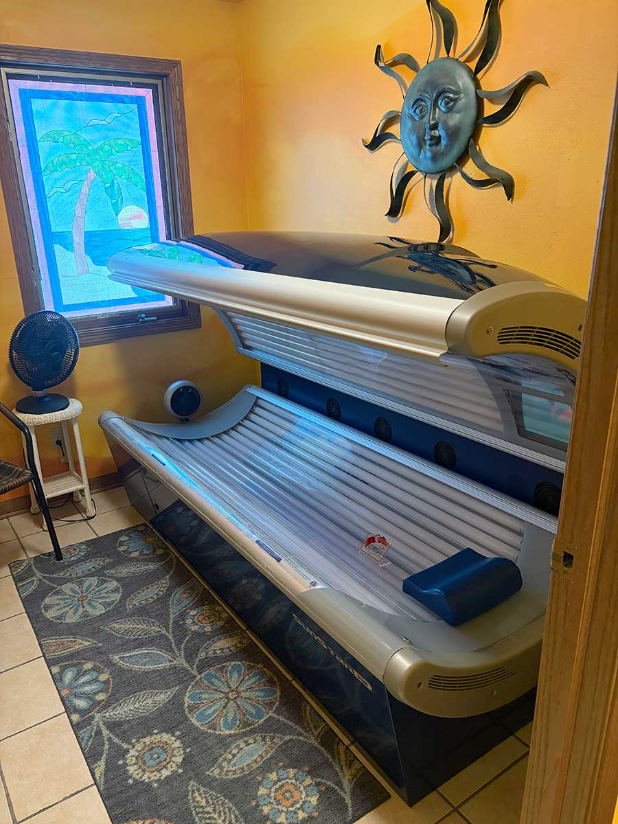 Private wellness and red light tanning room at Celestial Sun